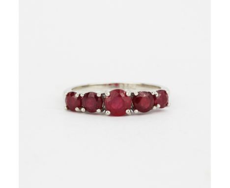 A 925 silver ring set with round cut rubies, (N).