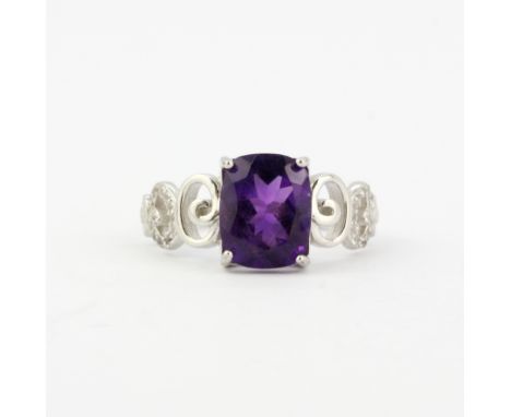 A 925 silver ring set with a cushion cut amethyst and white stones, (N.5).