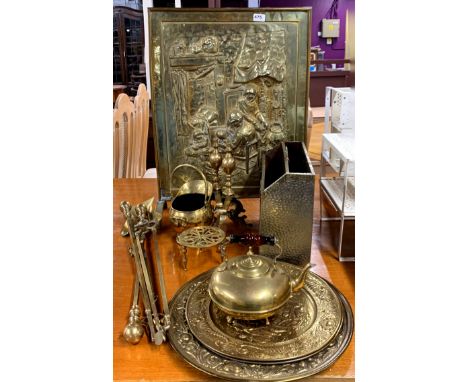 A large hammered brass fire screen, H. 72, together with fire dogs and fire tools and other brassware.