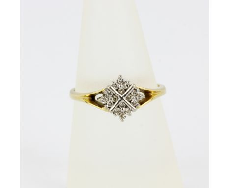 An 18ct yellow gold diamond set ring, (P.5).