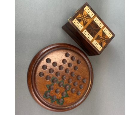 An inlaid rosewood card box and cribbage scorer, 16 x 10 x 8cm. with a mahogany solitaire board.