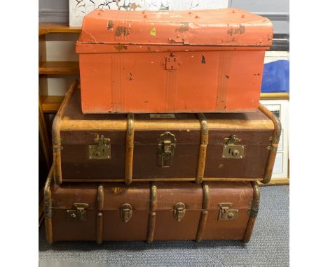 Two vintage wood and canvas cabin trunks and one tin trunk, largest 90 x 53 x 33cm.