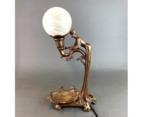 An Art Nouveau style cold cast figural table lamp, H. 47cm.