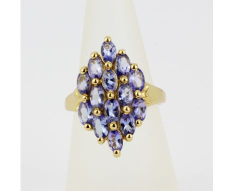 A 925 silver gilt ring set with oval cut tanzanites, approx. 3.25ct total, (O). With certificate.