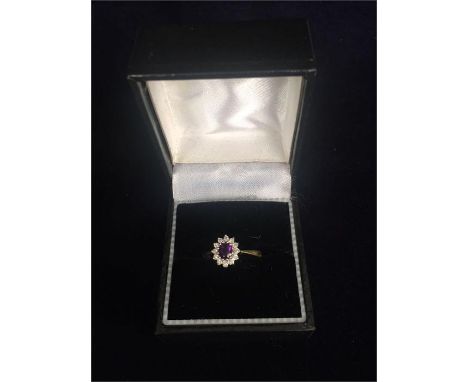 An 18ct Diamond and Amethyst ring