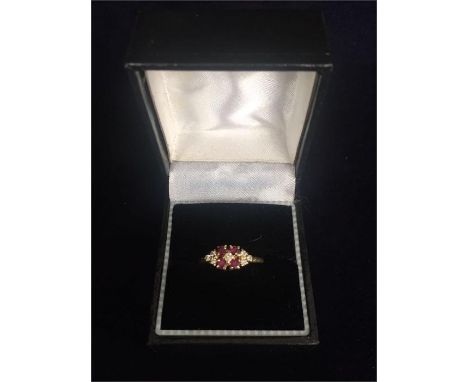An antique ring set with rubies and diamonds