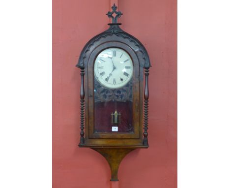 A 19th Century American walnut wall clock