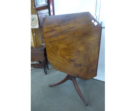 A George IV mahogany octagonal tilt-top tripod tea table