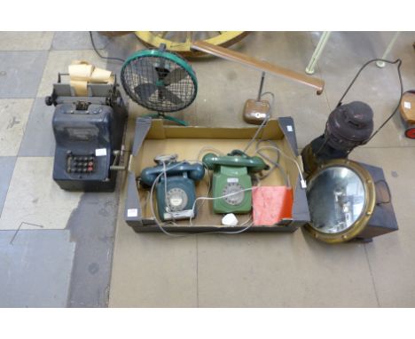A vintage Sundstrand adding machine, fan, two telephones, paraffin lamp, etc.