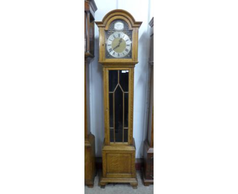 An oak triple weight longcase clock, 192cms h, a/f 