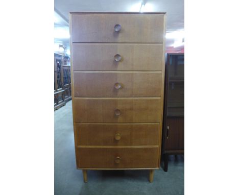 A light oak chest of drawers 