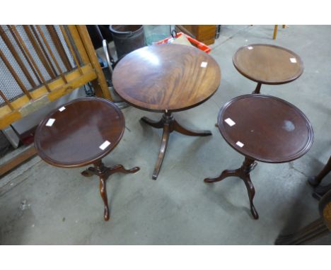 Four mahogany tripod occasional tables 