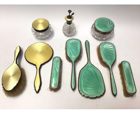 Art Deco silver and yellow guilloché enamel four piece dressing table set and one other silver and mint green enamel set (10 