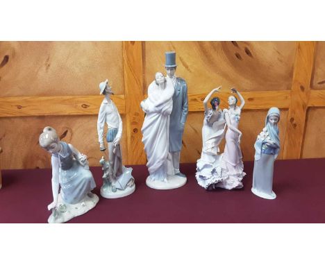 Four Lladro porcelain figures, together with a Nao figure group (5)The figure of the two dancers has an arm off but it is pre