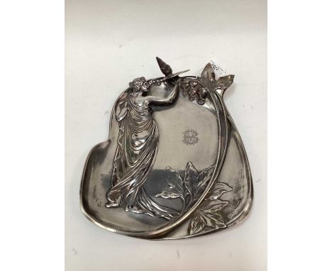 WMF Art Nouveau style dish, relief decorated with a woman holding a bird, marks to base, 32cm high
