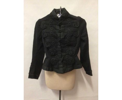 Victorian jacket with nipped waist, flared peplum, trim with black braid. A Victorian black under-bust corset with steel boni