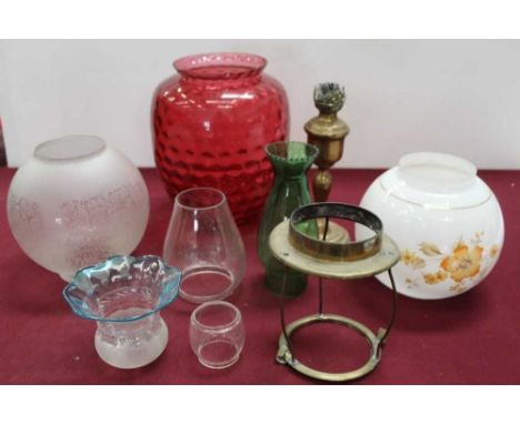 Three boxes containing glass oil lamp shades and chimneys