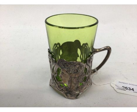 Art Nouveanu WMF cup with green glass liner, with pierced decoration and profile portraits, stamped marks to base, 11cm high