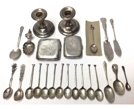 Two silver cigarette cases, together with a pair of dwarf silver candlesticks and assorted silver flatware (various dates and