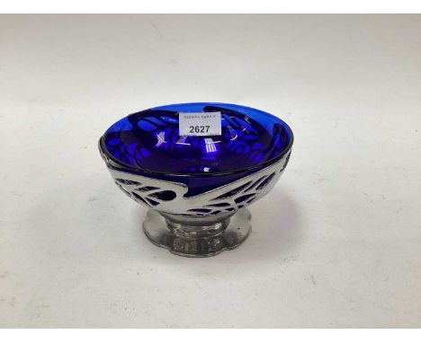 Art Nouveau style pewter bowl with blue glass liner, pierced design, 14.5cm diameter