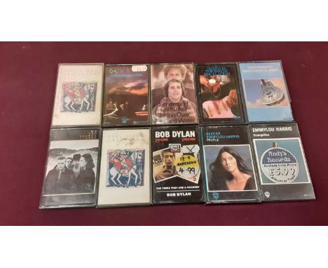 Box of music cassettes including Bob Dylan, Eric Clapton, Paul Simon, Dire Straits, Simon &amp; Garfunkel, Genesis, Joni Mitc