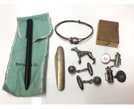Group to include silver greyhound, two pairs of novelty silver golfing cufflinks, Tiffany pen, silver and gold bangle, DuPont