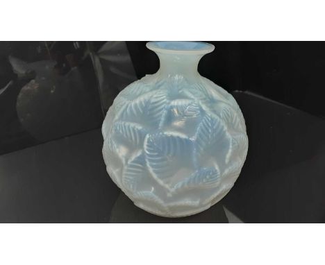 Rene Lalique Ormeaux pattern opalescent glass vase, signed on base, 17cm highThere is a crack running around the base. Otherw