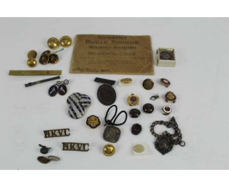 Victorian Honourable Artillery Company badge together with a book of Infantry Bugle sounds and Regimental calls, together wit
