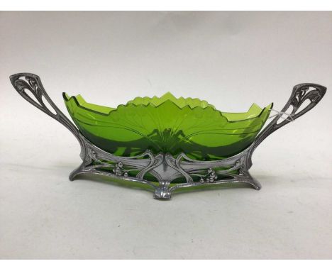 Art Nouveau table centre with green cut and etched glass liner, of lozenge form with two handled, stamped number 252 to base,