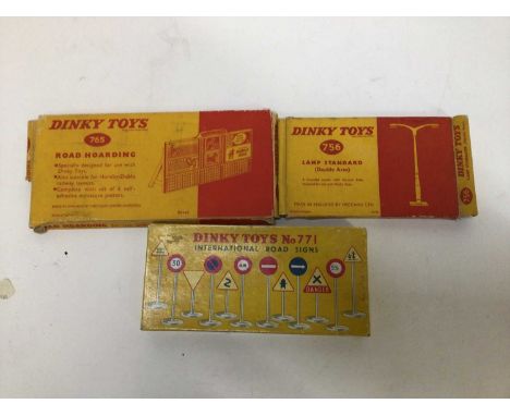 Dinky international road signs set No. 771, lamp standard No. 756, road hoarding No. 765 all boxed