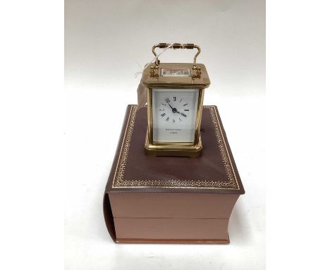 Matthew Norman brass carriage clock, with original box and reciept purchased 1976The clock appears to be in good condition co