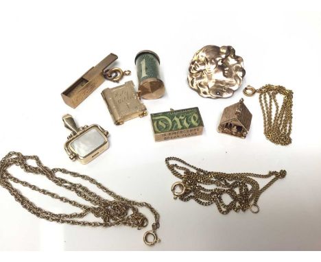 Five 9ct gold novelty charms, novelty domino charm (possibly Russian) and an Art Nouveau brooch, together with three 9ct gold