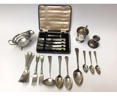 Group silver including gravy boat, cup, dwarf candlestick, pusher, four silver butter knifes with mother of pearl handles in 