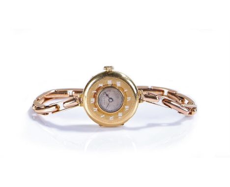 Asprey 18 carat gold ladies wristwatch, the case with an outer white Roman numeral dial and silvered Asprey dial to the centr
