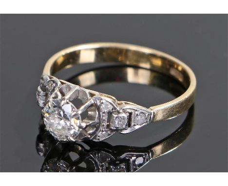 18 carat gold diamond set ring, the round cut diamond at approximately 0.63 carat, ring size R