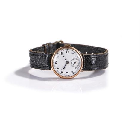 9 carat gold gentleman's wristwatch, the white enamel dial with black Arabic hours, manual wound, the case 32mm diameter  
