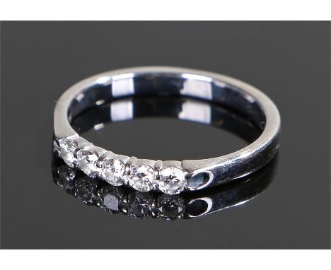 18 carat white gold diamond ring, set with five round cut diamonds to the head, ring size M