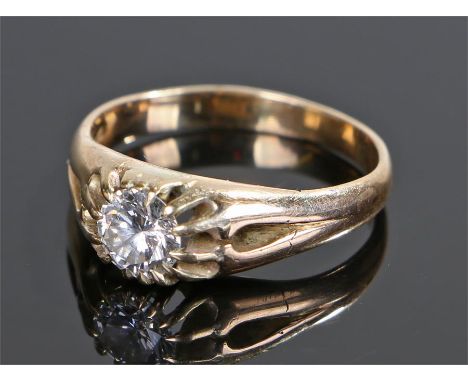 Yellow metal diamond solitaire ring, the round cut diamond at approximately 0.9 carat in size, ring size R