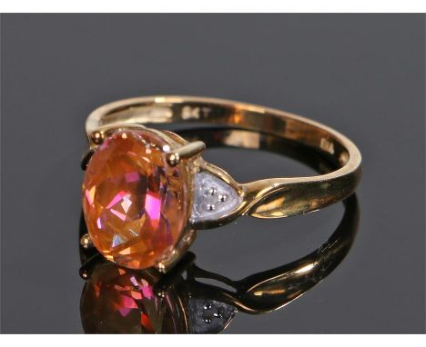 9 carat gold and twilight topaz ring, the topaz set with four claws, ring size P