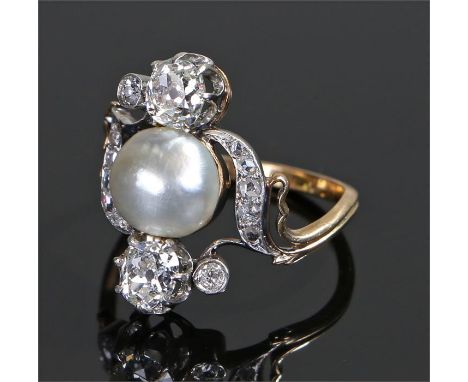 Pearl and diamond set ring the central saltwater pearl at 3.49 carats and a diamond surround, ring size P