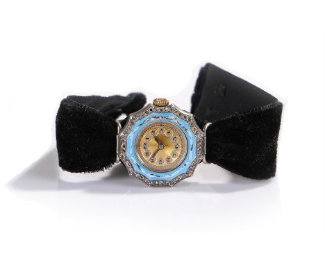 Silver and enamel wristwatch, the gilt dial with Arabic hours and blue enamel edge with a stone set wavy border, manual wound