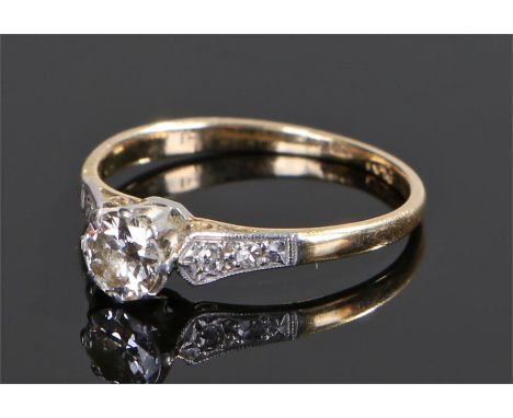 18 carat gold diamond solitaire ring, the round cut diamond at approximately 0.4 carat, ring size L