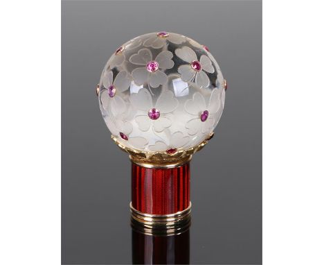 Faberge, a fine Faberge rock crystal, ruby, gold and silver cane handle, the ball top with flowers carved centred by rubies a