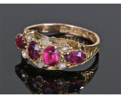 19th Century garnet and pearl set ring, with four garnets to the head with four pearls, ring size L