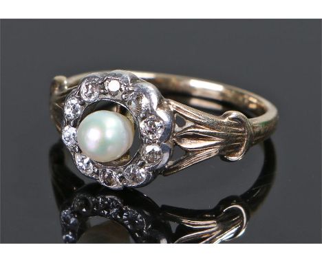 Pearl and diamond set ring, the central pearl with a diamond surround, on a yellow metal shank, ring size O