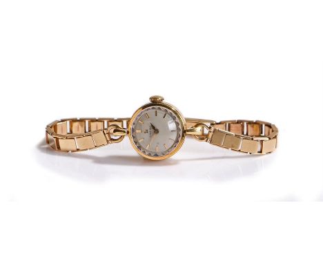 Omega 9 carat gold ladies wristwatch, the signed silvered dial with baton hours, manual wound, with a 9 carat gold bracelet s