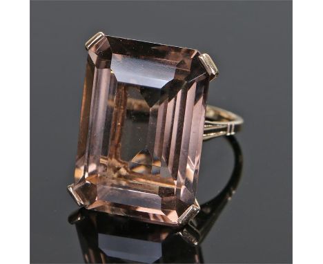 9 carat gold smoky quartz ring, the emerald cut smoky quartz faceted stone set with four claws, ring size P