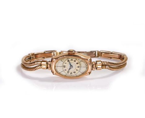 9 carat gold ladies wristwatch, the shaped rectangular dial with Arabic hours, manual wound, the case 14mm diameter 