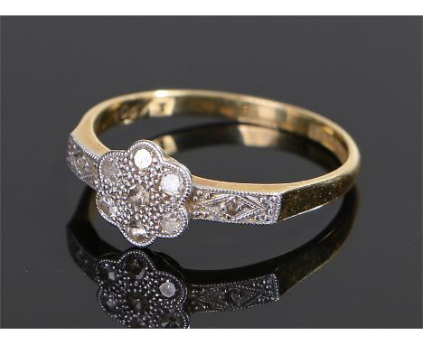 18 carat gold diamond set ring, in the form of a flower head, ring size Q