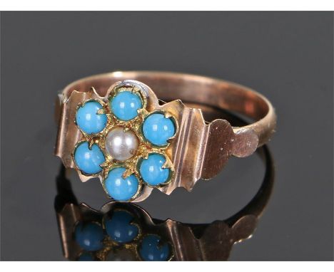 Victorian turquoise and pearl set ring, with a central pearl and turquoise surround to form a flower head, ring size K